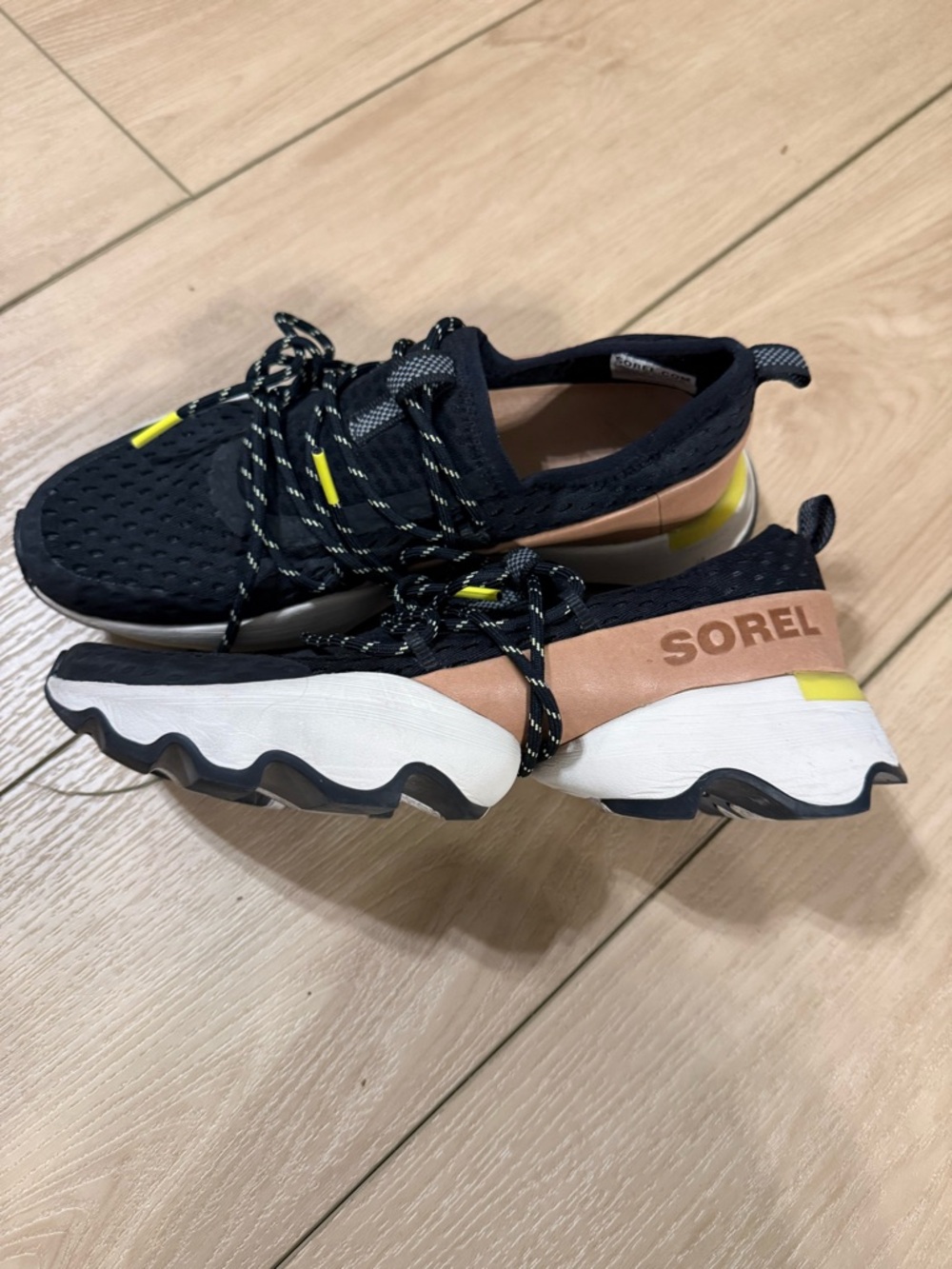 Sorel Black Knit Slip-On Sneakers with Tan and Yellow Accents